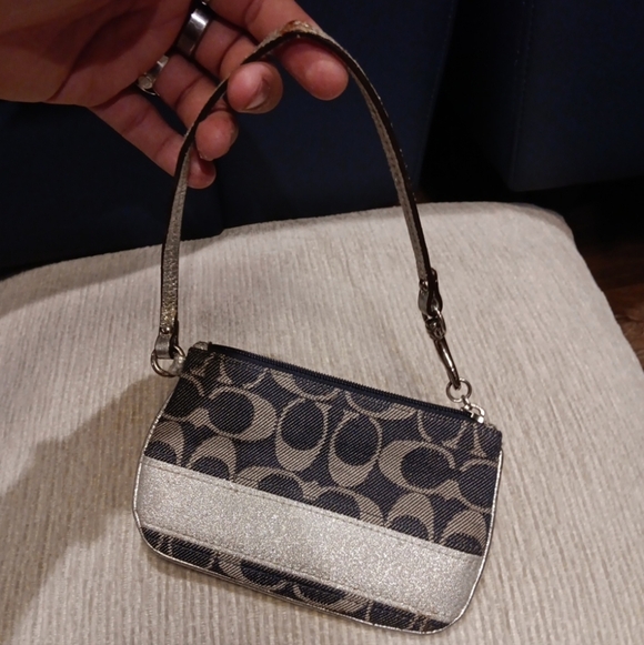 Coach Handbags - Vintage Coach Black and Silver Wristlet